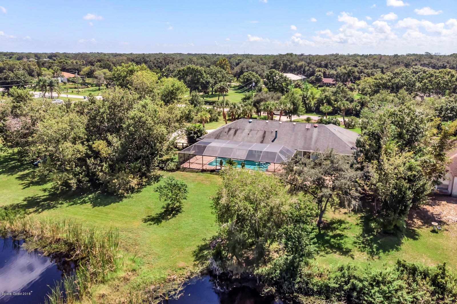 4300 Country Road Melbourne, FL 32934 - Photo 35 of 46 Rear Aerial View With Pond