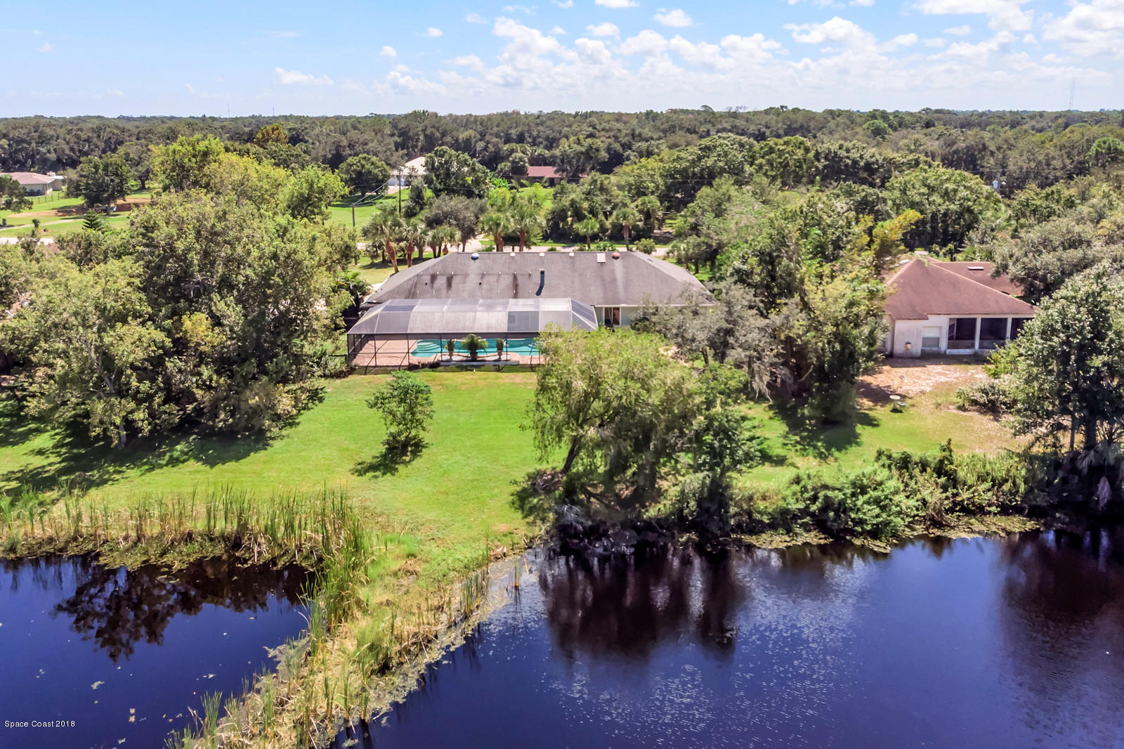 4300 Country Road Melbourne, FL 32934 - Photo 36 of 46 Rear Aerial View With Pond
