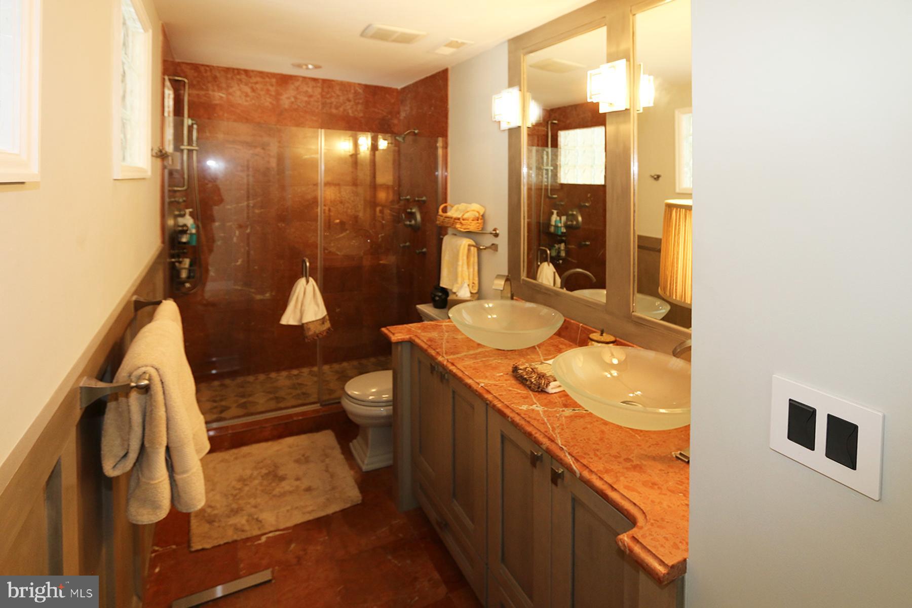 31 6th Street, Unit B Rehoboth Beach, DE 19971 - Photo 27 of 37 31B Sixth St Owner's Bath with Dual Showers