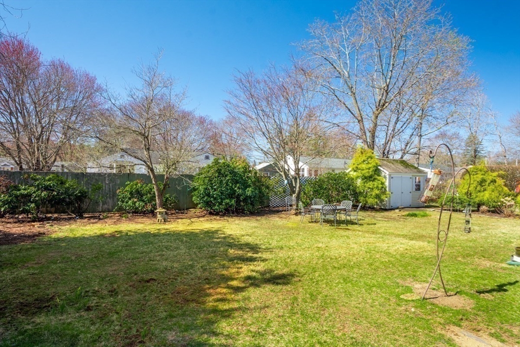 4 Worcester Road Sharon, MA 02067 - Photo 20 of 25 a view of a yard with a house