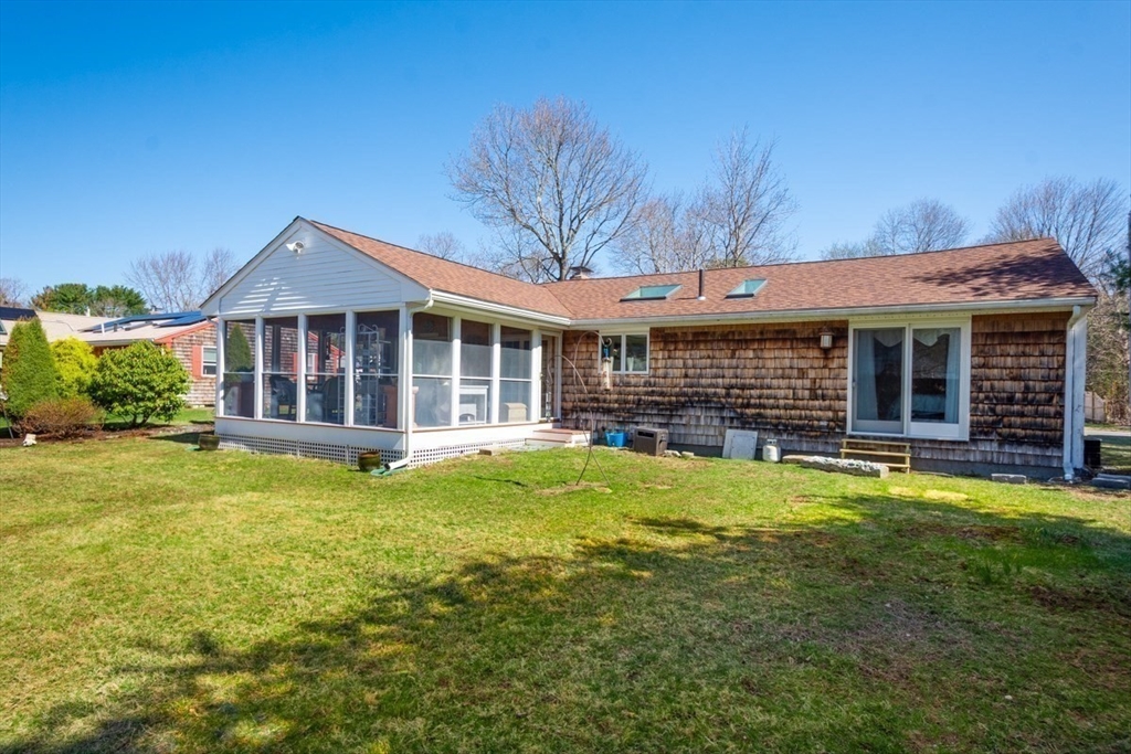 4 Worcester Road Sharon, MA 02067 - Photo 21 of 25 a view of a house with a yard and sitting area