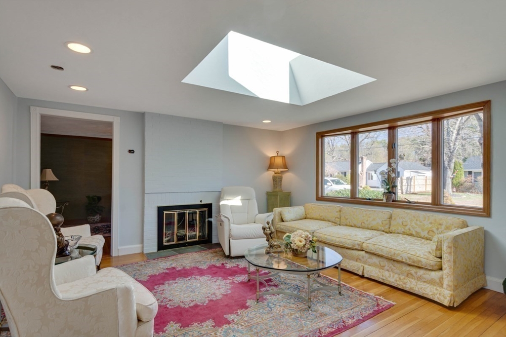 4 Worcester Road Sharon, MA 02067 - Photo 4 of 25 a living room with furniture and a fireplace