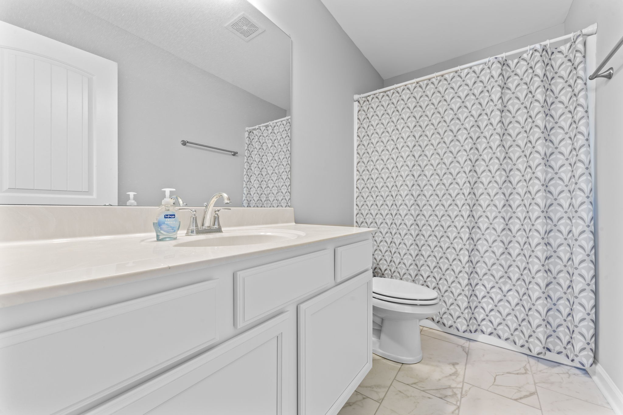 5711 Dockside Drive Rockvale, TN 37153 - Photo 25 of 30 a bathroom with a sink toilet and a mirror