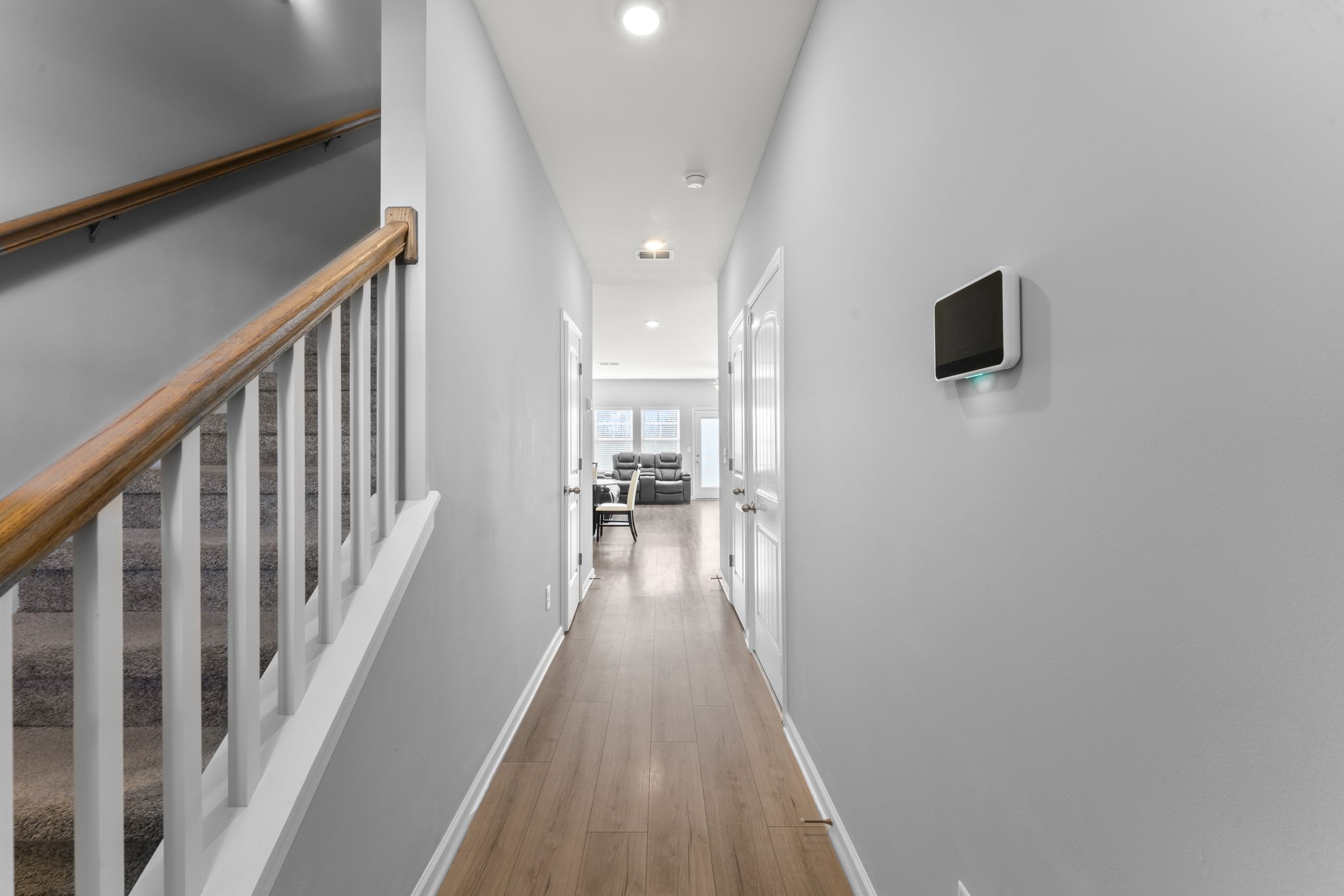 5711 Dockside Drive Rockvale, TN 37153 - Photo 4 of 30 a view of a hallway with wooden floor and staircase