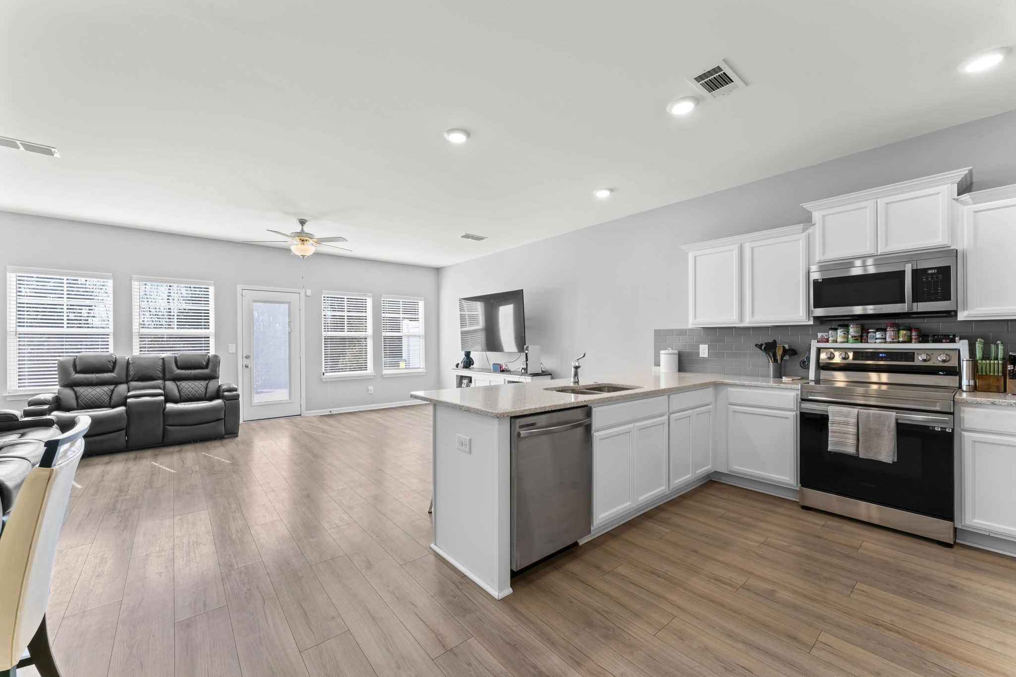 5711 Dockside Drive Rockvale, TN 37153 - Photo 6 of 30 a kitchen with stove and wooden floor