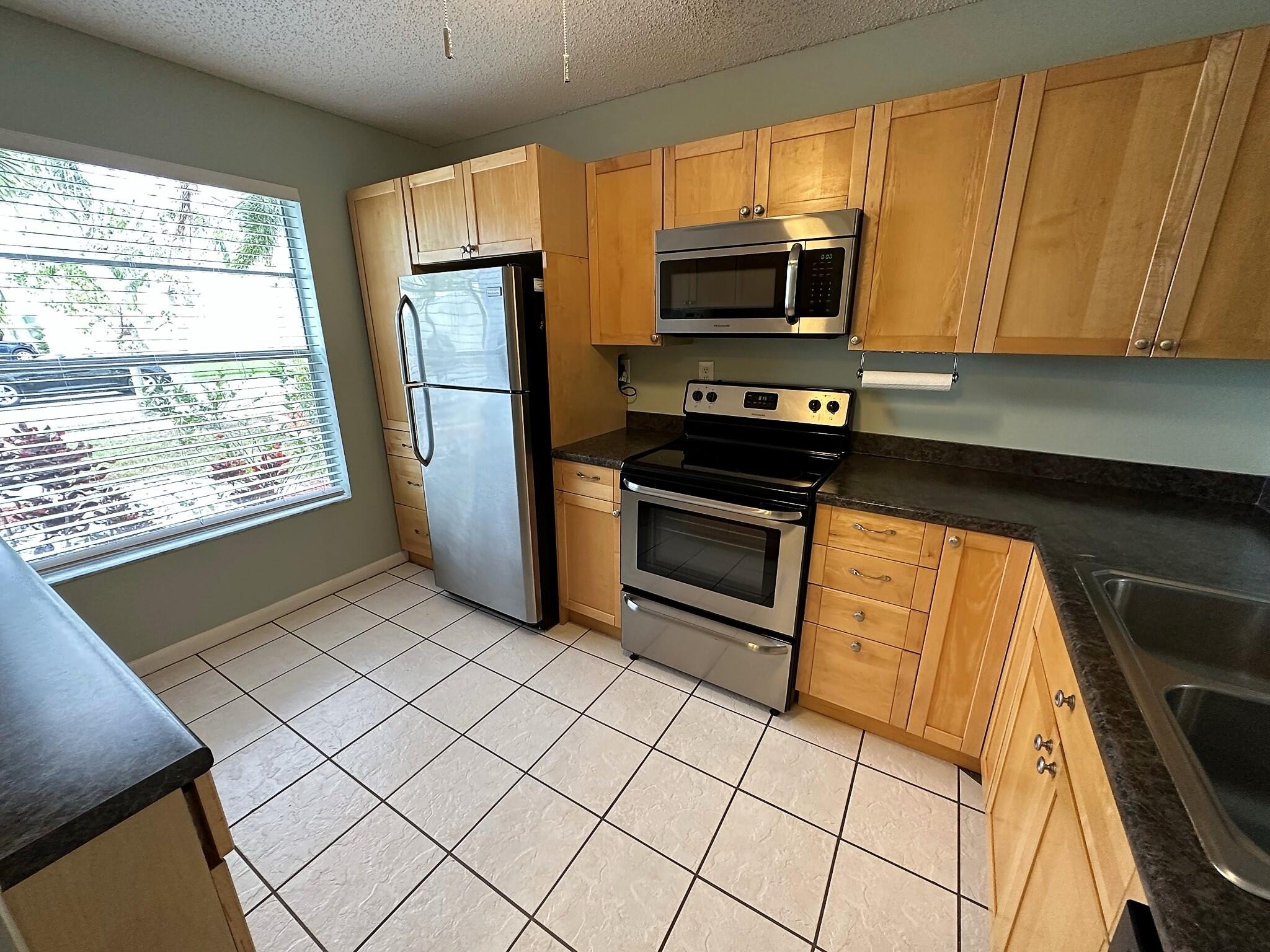 149 Deerfield Drive Jupiter, FL 33458 - Photo 2 of 14 IMG_0004