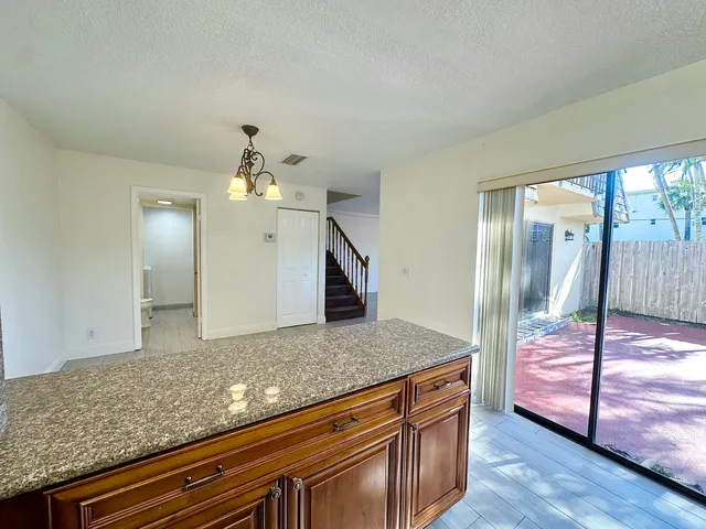 a view of living room and staircase