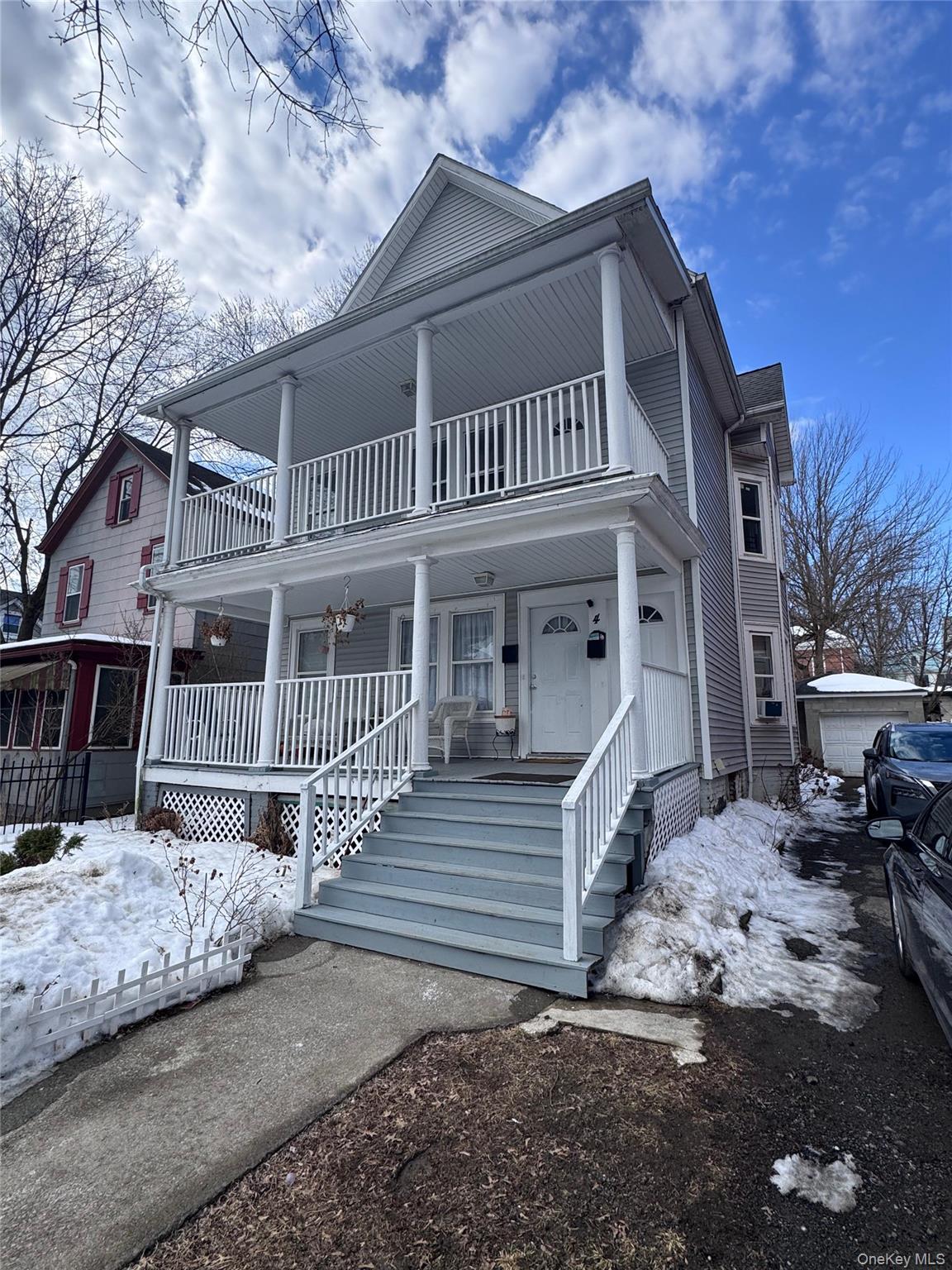 a front view of a house with a porch