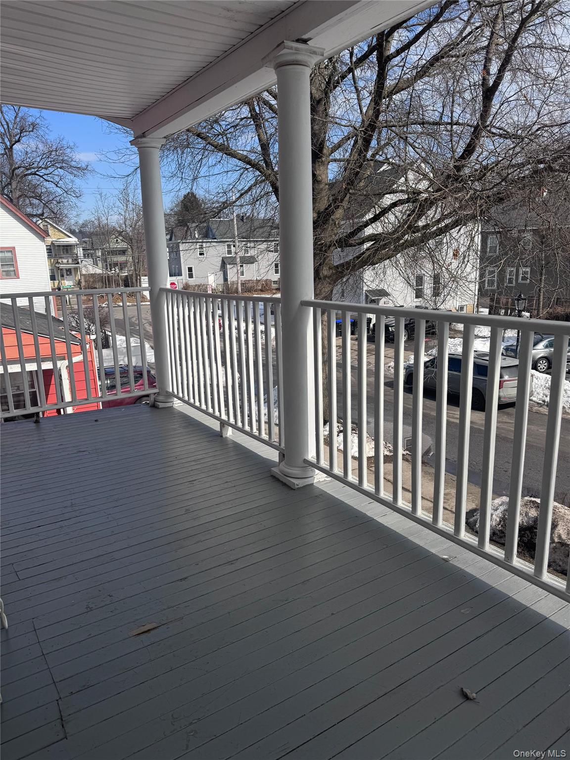 4 Gray Street, Unit #2 Poughkeepsie, NY 12603 - Photo 8 of 27 a view of a porch with wooden floor and fence