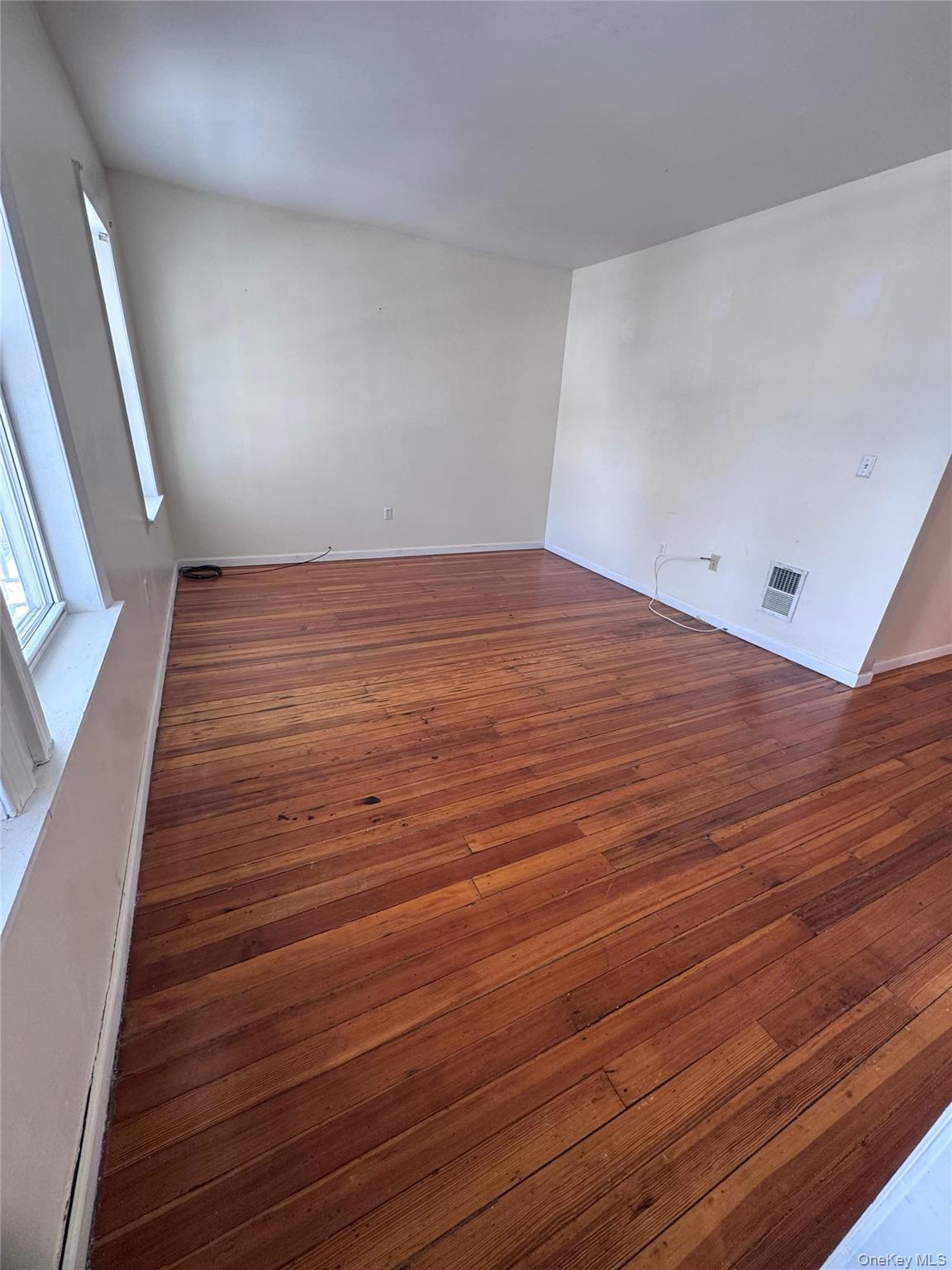 4 Gray Street, Unit #2 Poughkeepsie, NY 12603 - Photo 9 of 27 an empty room with wooden floor