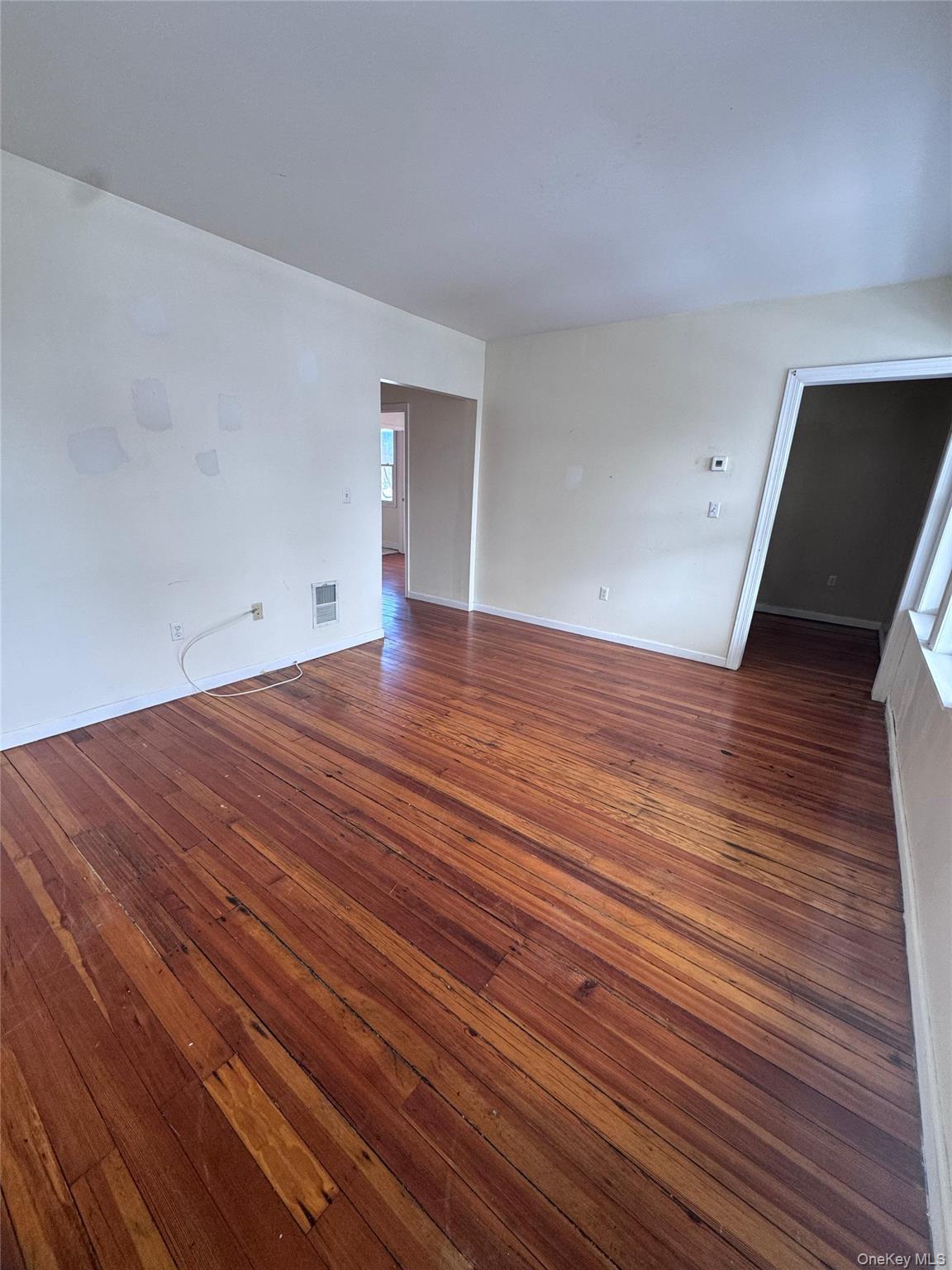 4 Gray Street, Unit #2 Poughkeepsie, NY 12603 - Photo 10 of 27 a view of empty room with wooden floor