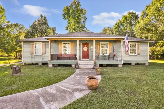 front view of a house with a yard