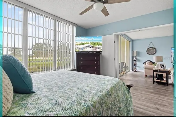 a bathroom with a granite countertop sink mirror and double