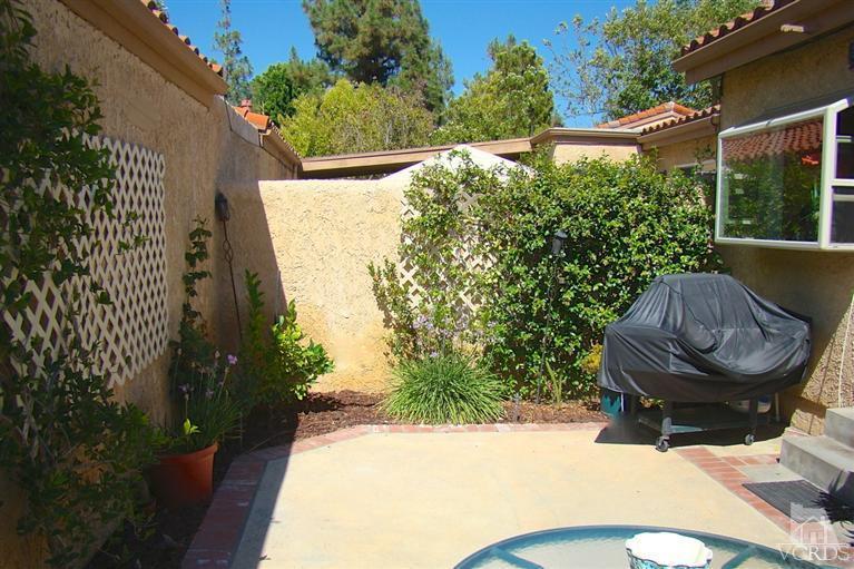 19515 Rinaldi Street, Unit 54 Northridge, CA 91326 - Photo 15 of 20 a view of outdoor space and yard