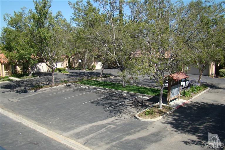 19515 Rinaldi Street, Unit 54 Northridge, CA 91326 - Photo 17 of 20 a view of a street with sitting area