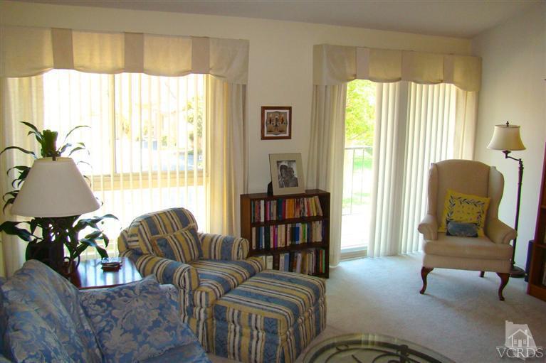 19515 Rinaldi Street, Unit 54 Northridge, CA 91326 - Photo 3 of 20 a living room with furniture and a window