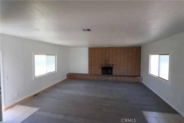 an empty room with windows