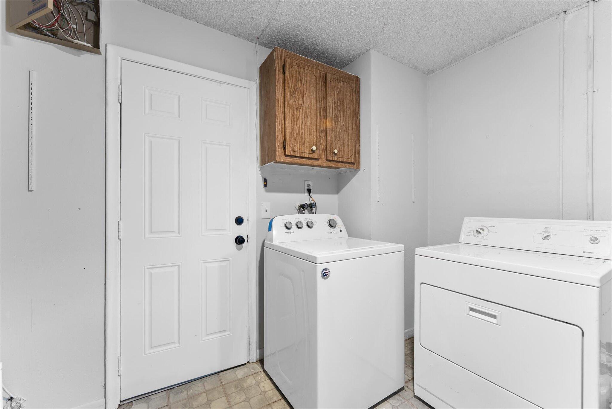 22267 Southwest 57th Avenue Boca Raton, FL 33428 - Photo 25 of 30 a utility room with dryer and washer