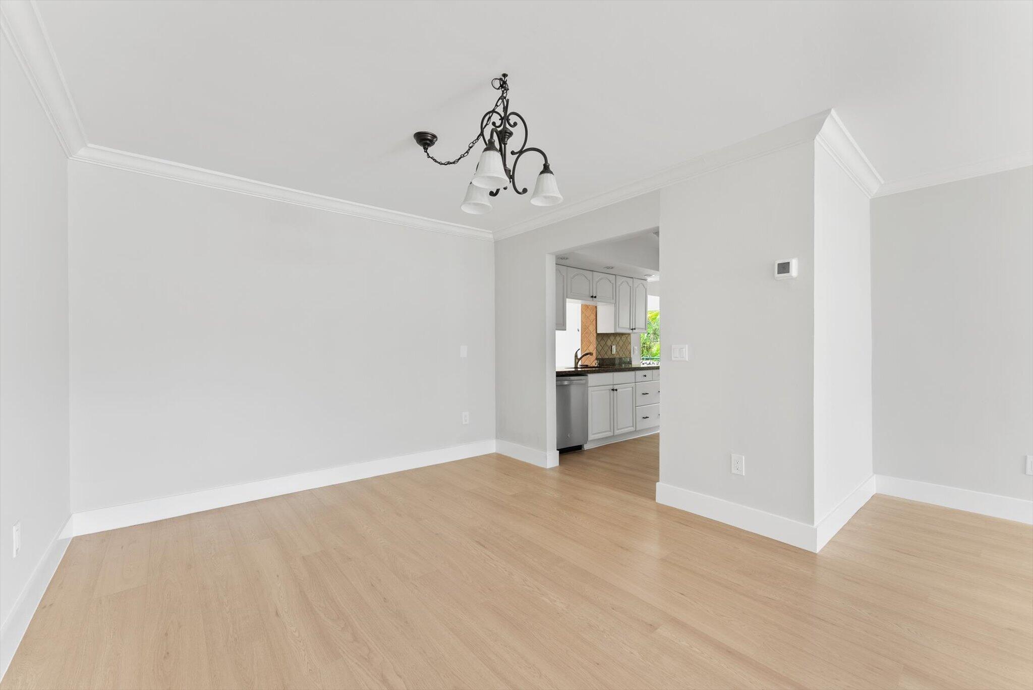 22267 Southwest 57th Avenue Boca Raton, FL 33428 - Photo 8 of 30 a view of an empty room with a window