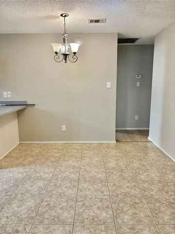 a view of a livingroom with a chandelier