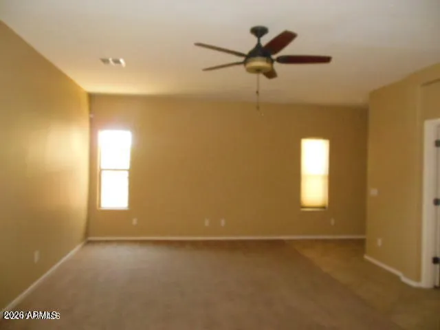 a view of a window in an empty room
