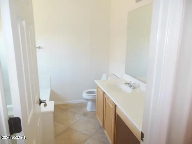 a bathroom with a sink toilet and tub