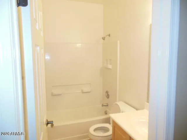 a bathroom with a tub and shower
