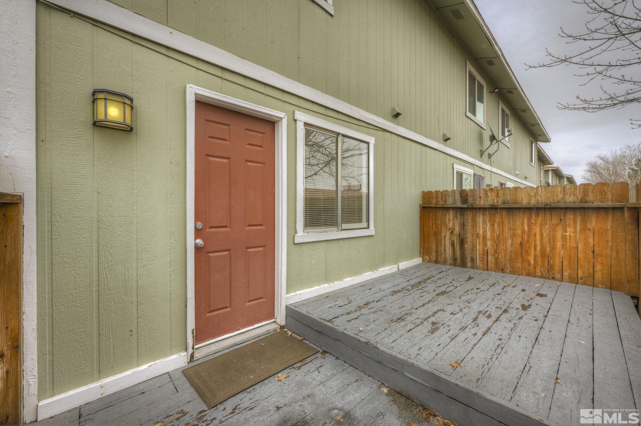 1424 East 9th Street, Unit 3 Reno, NV 89512 - Photo 2 of 26 a view of wooden house with a wooden door