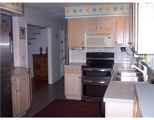 26 Narrows Road Bristol, RI 02809 - Photo 5 of 17 Kitchen. Open kitchen with state of the art stainless steel appliance. Double stainless steel sinks. Huge pantry off kitchen and built-in coffee pot. Pickled cabinets