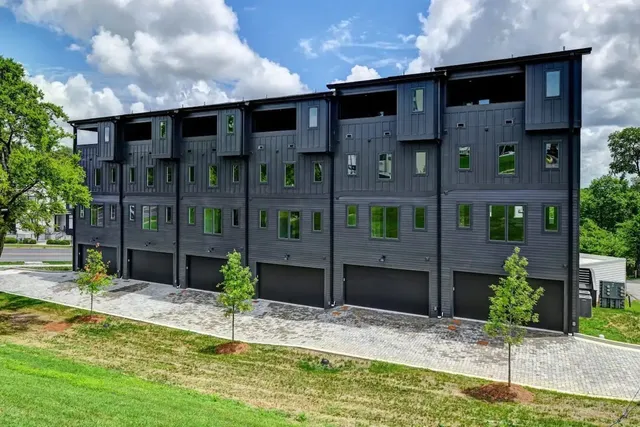 a view of house with yard