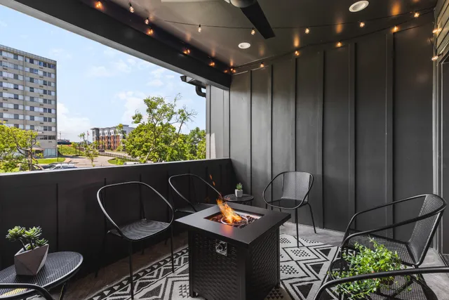 a outdoor dining space with furniture