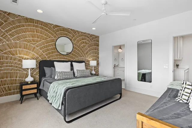 a bedroom with a bed and dresser