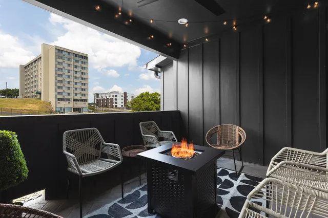 a kitchen with a table and chairs