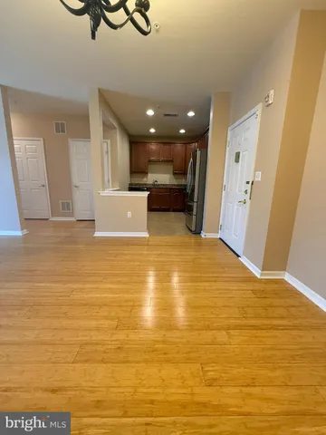 a view of a living room with a large window