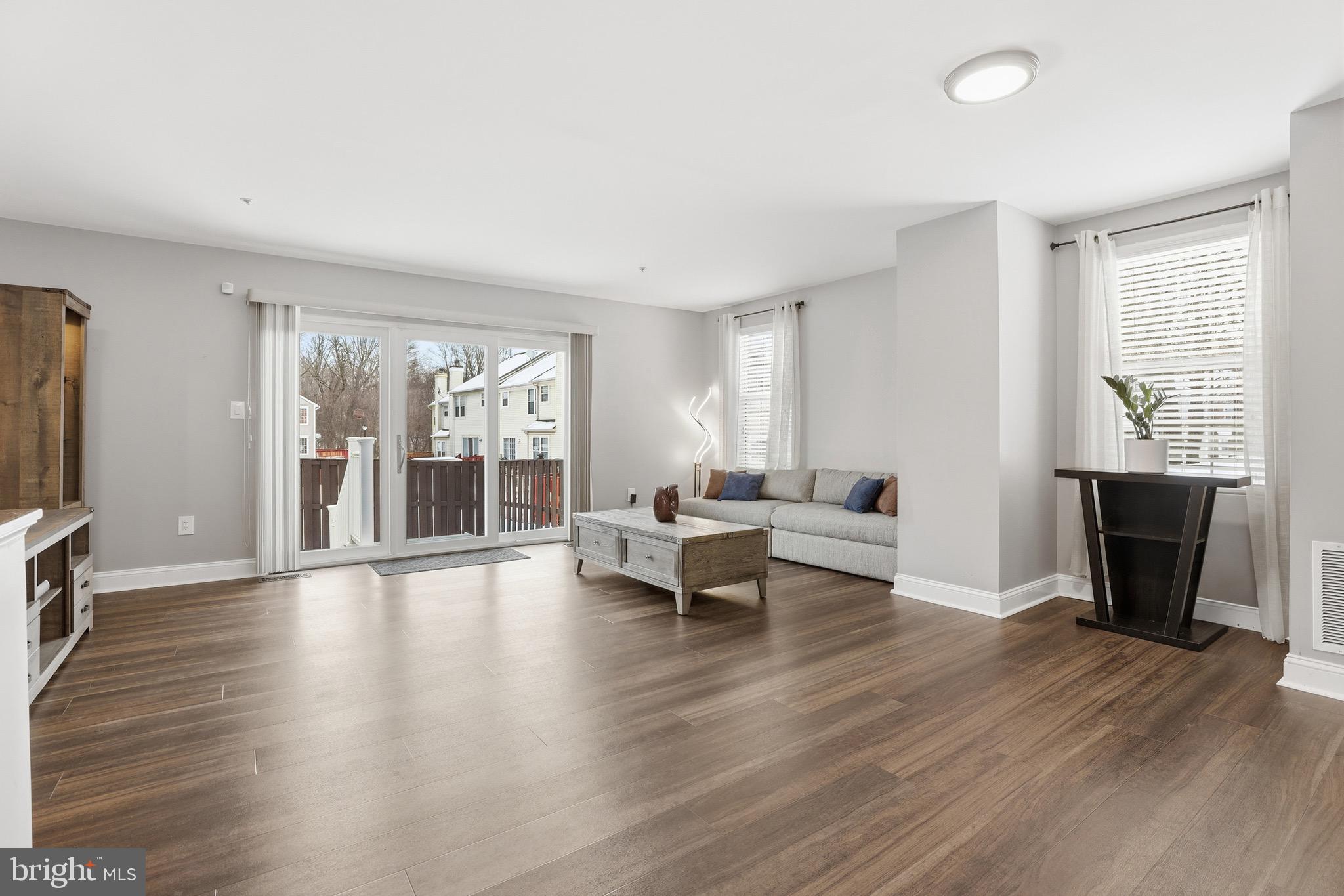 10724 Kitchener Court Bowie, MD 20721 - Photo 11 of 31 a living room with furniture and a flat screen tv