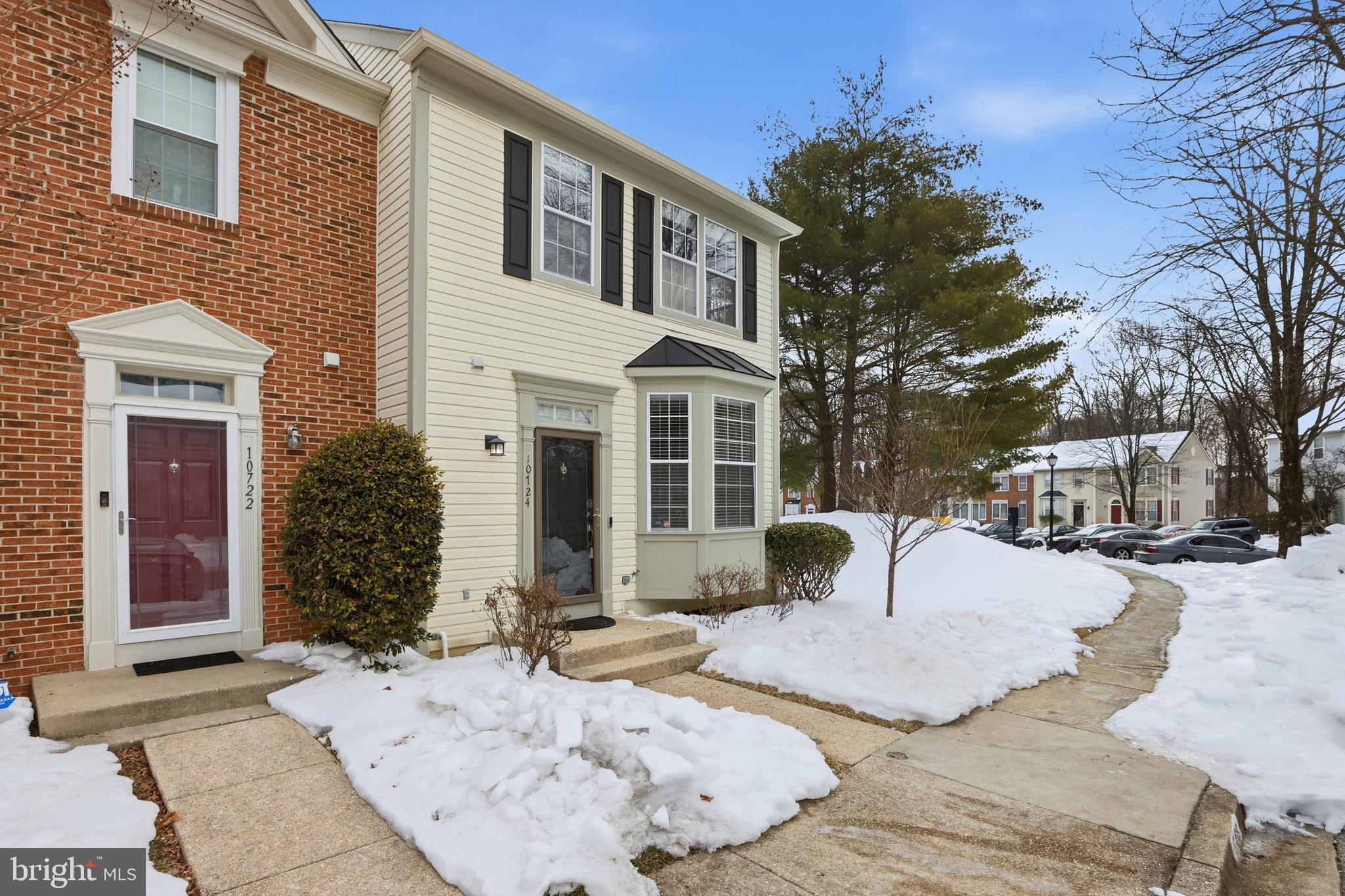 10724 Kitchener Court Bowie, MD 20721 - Photo 2 of 31 a view of a patio with couches and table and chairs and potted plants
