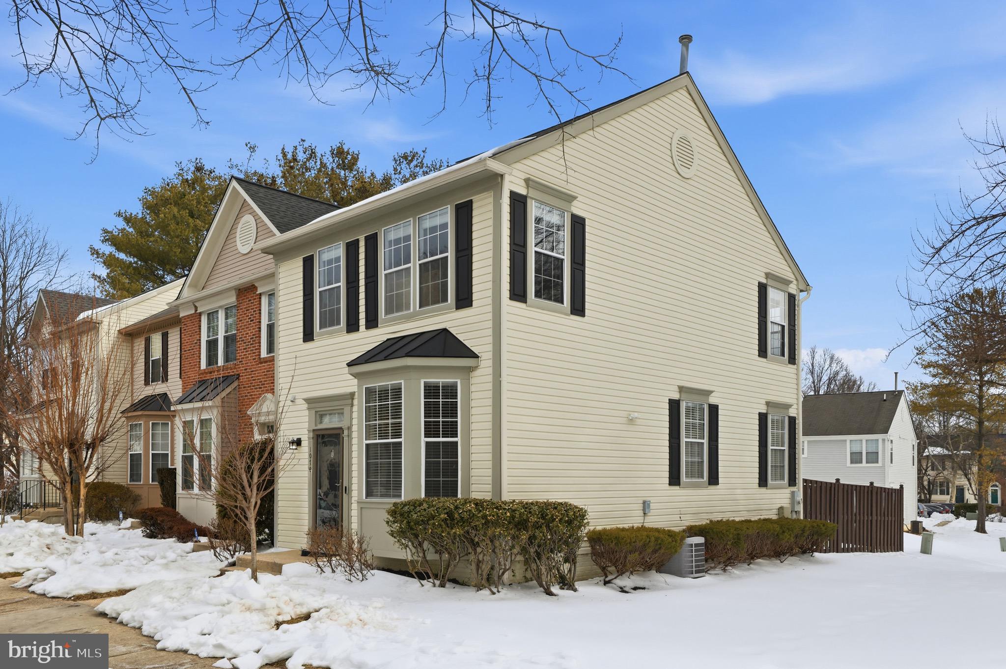 10724 Kitchener Court Bowie, MD 20721 - Photo 3 of 31 a front view of a house with a yard