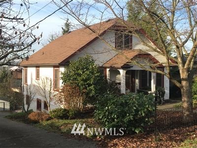 1523 Lake Avenue South Renton, WA 98055 - Photo 2 of 27 a front view of a house with a yard