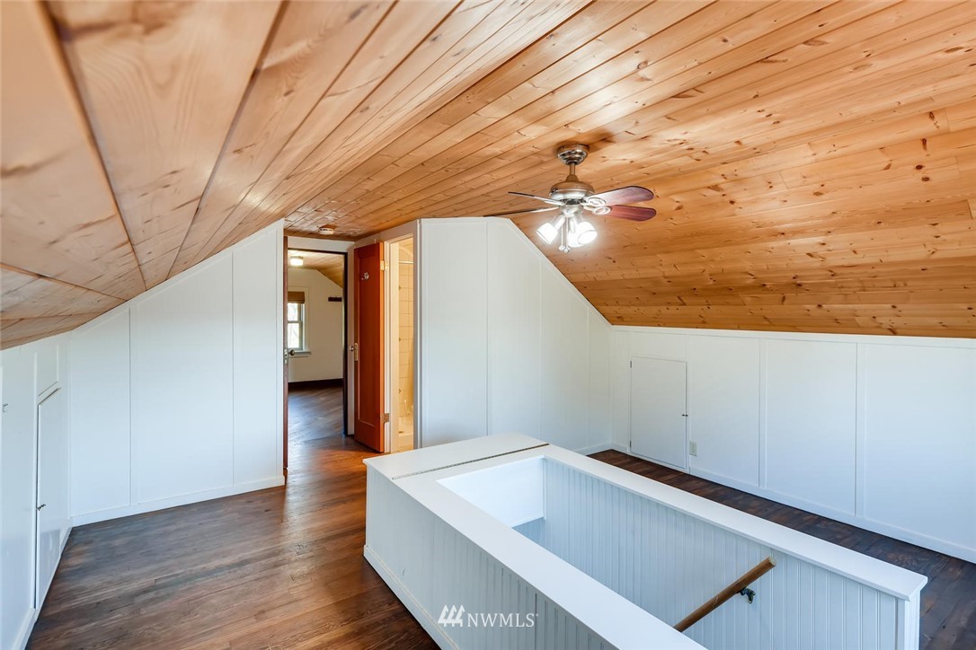 1523 Lake Avenue South Renton, WA 98055 - Photo 15 of 27 a view of an empty room with wooden floor