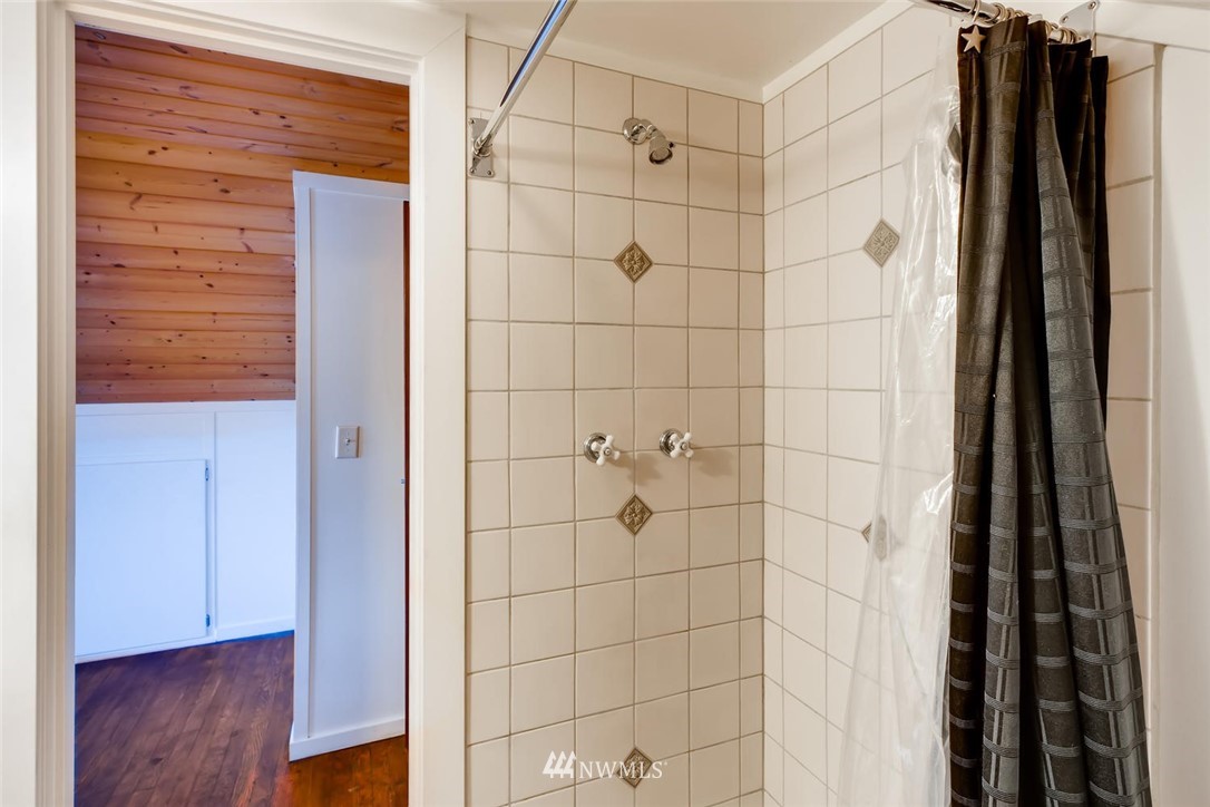 1523 Lake Avenue South Renton, WA 98055 - Photo 19 of 27 a bathroom with a shower