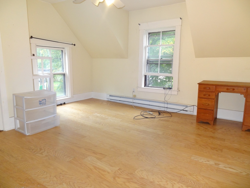 48 Maple Street, Unit 2 Holden, MA 01520 - Photo 9 of 17 an empty room with a window