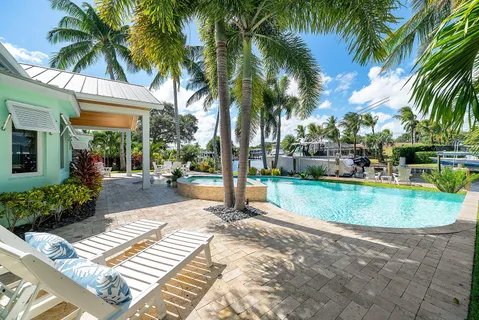 a view of a swimming pool with a sitting space