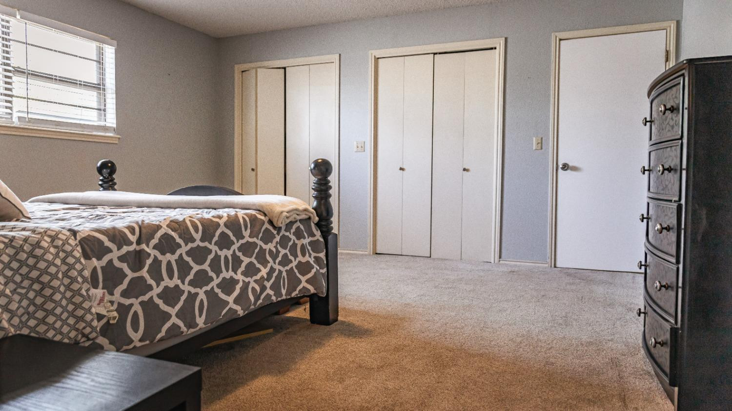 910 Southwest 10th Street Seminole, TX 79360 - Photo 21 of 40 Bedroom #2 (view to door & closets)
