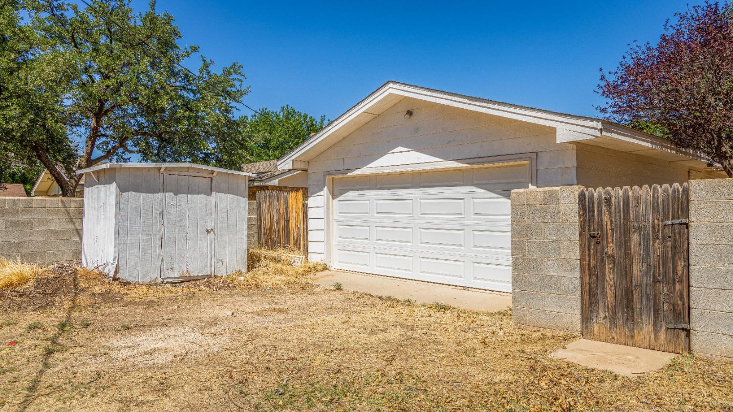 910 Southwest 10th Street Seminole, TX 79360 - Photo 39 of 40 2 car detached garage spaces + shed.