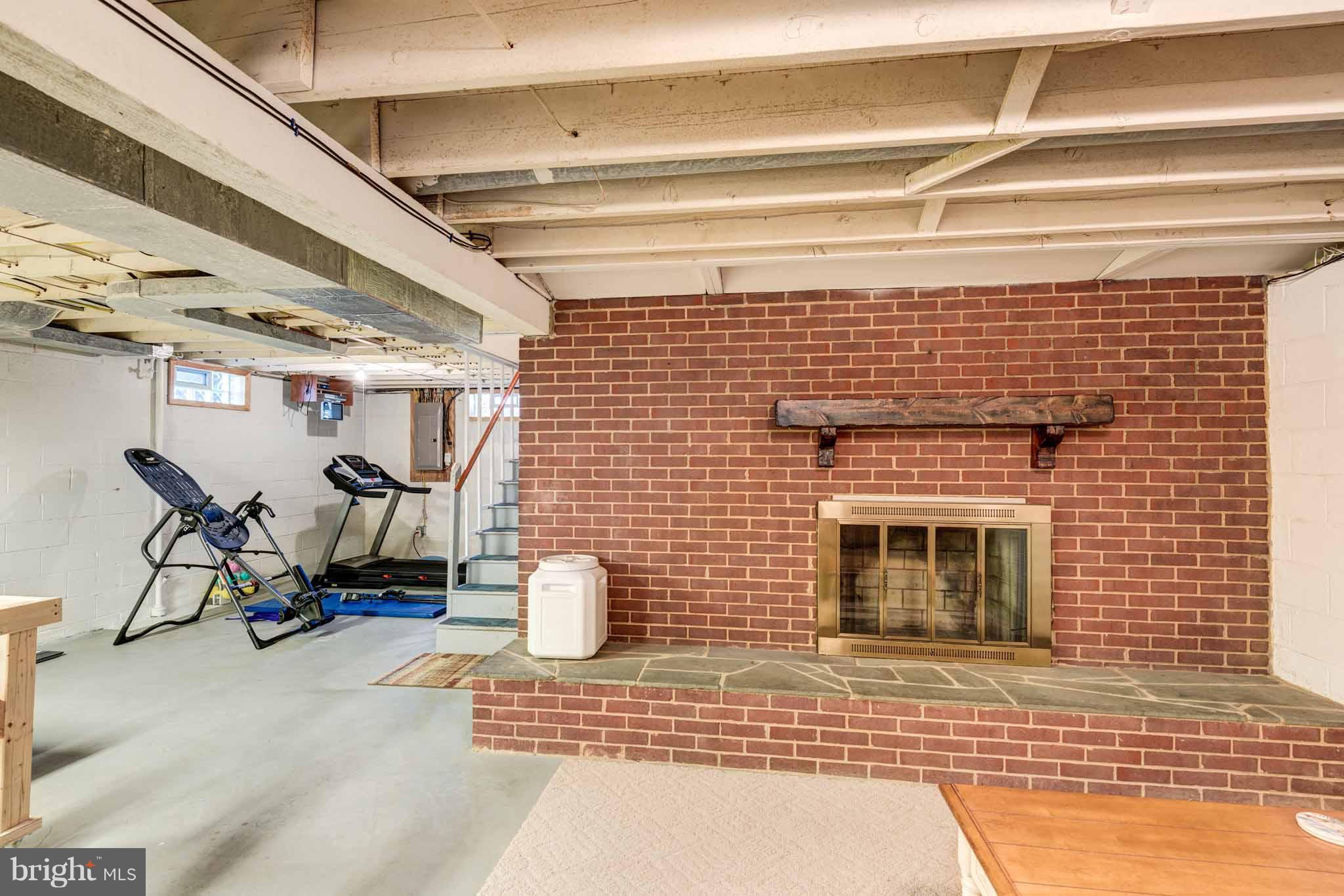 8456 Kenton Road Pasadena, MD 21122 - Photo 22 of 30 Basement - Wood Burning Fireplace