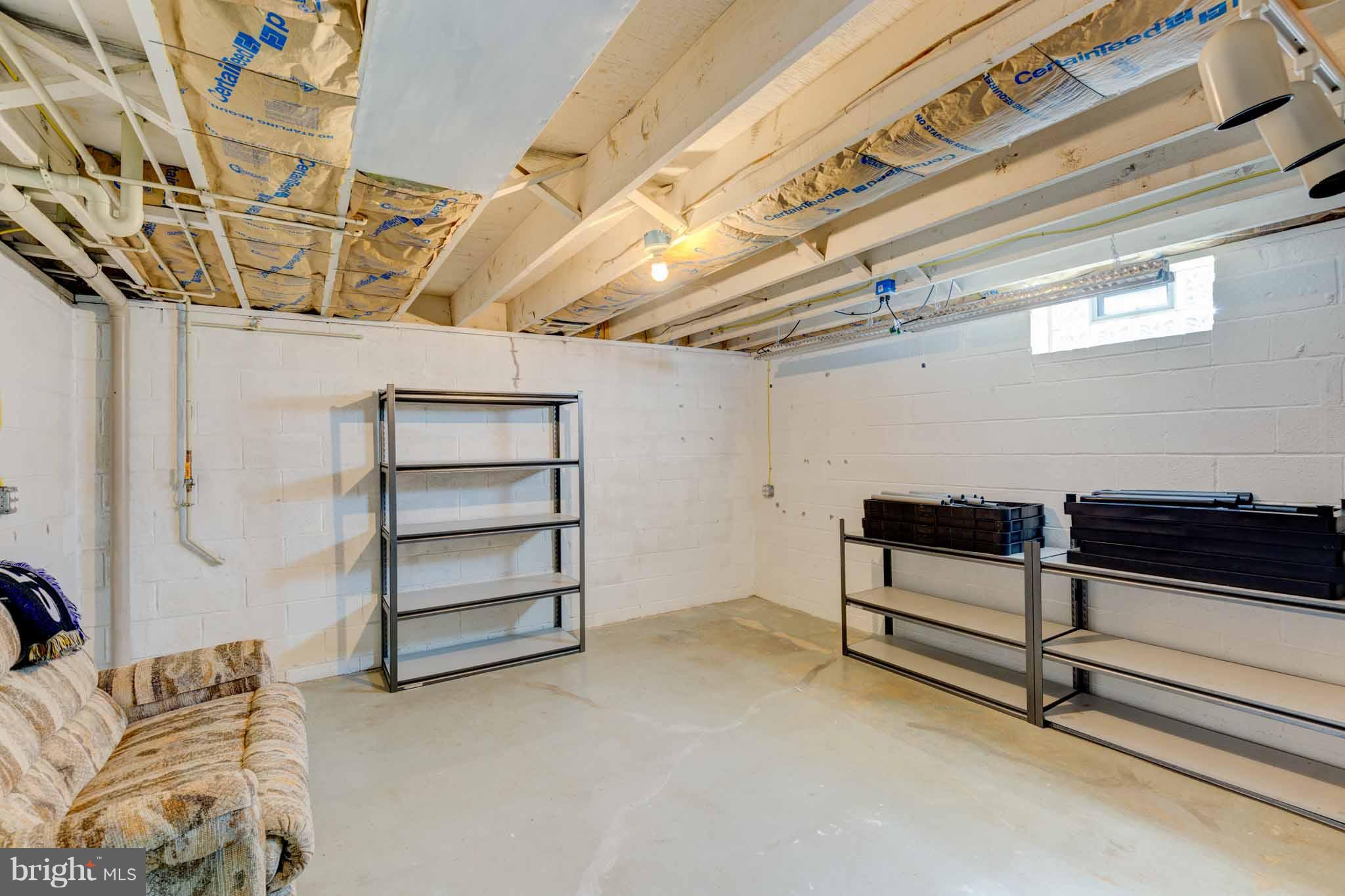 8456 Kenton Road Pasadena, MD 21122 - Photo 23 of 30 Storage Shelving stays