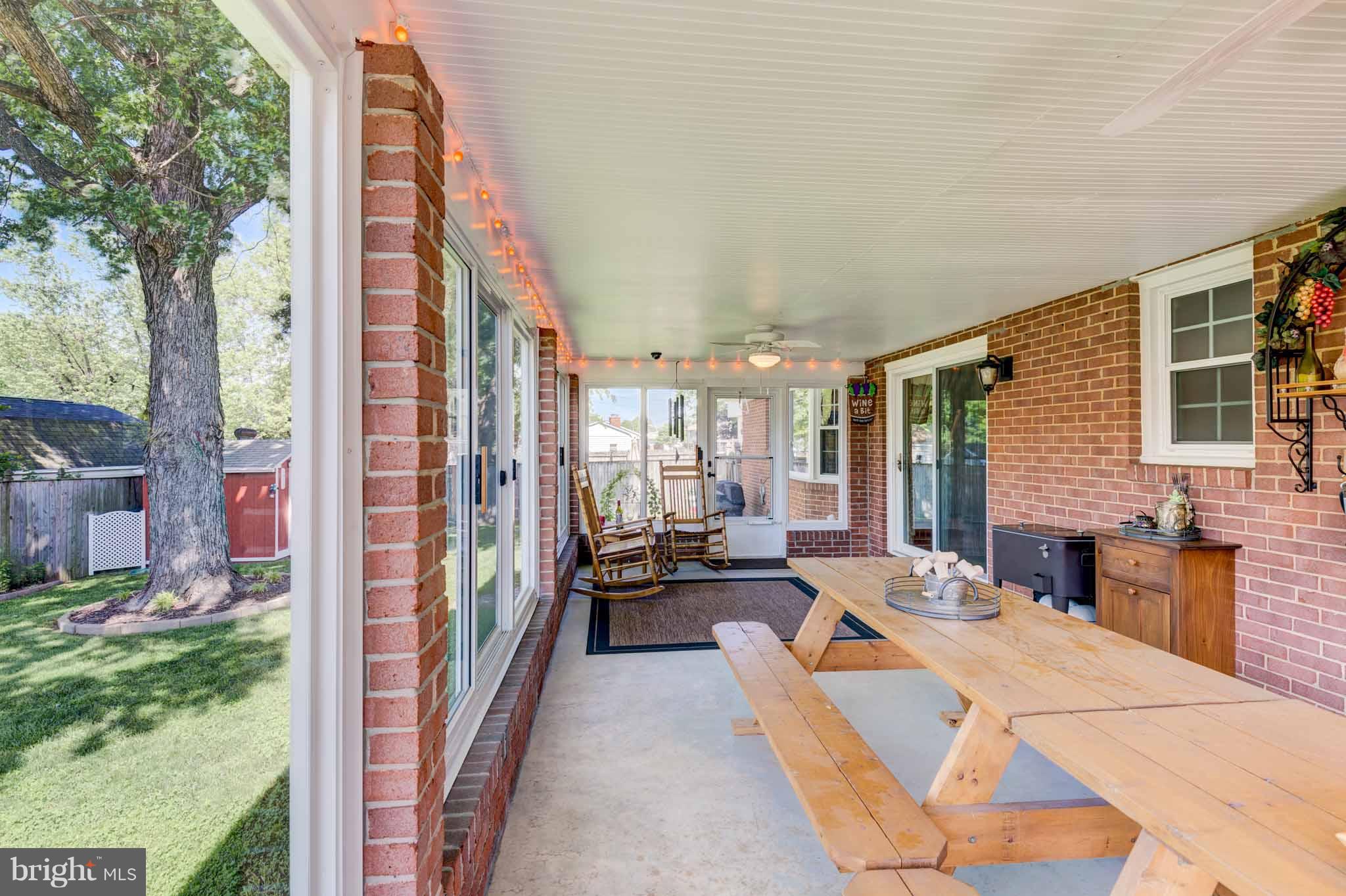 8456 Kenton Road Pasadena, MD 21122 - Photo 25 of 30 Sun Porch - Picnic table stays
