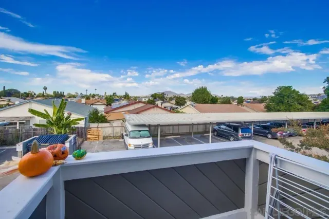 a view of a chairs and table in the patio