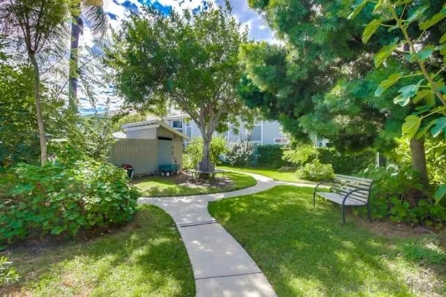a garden view with a seating space