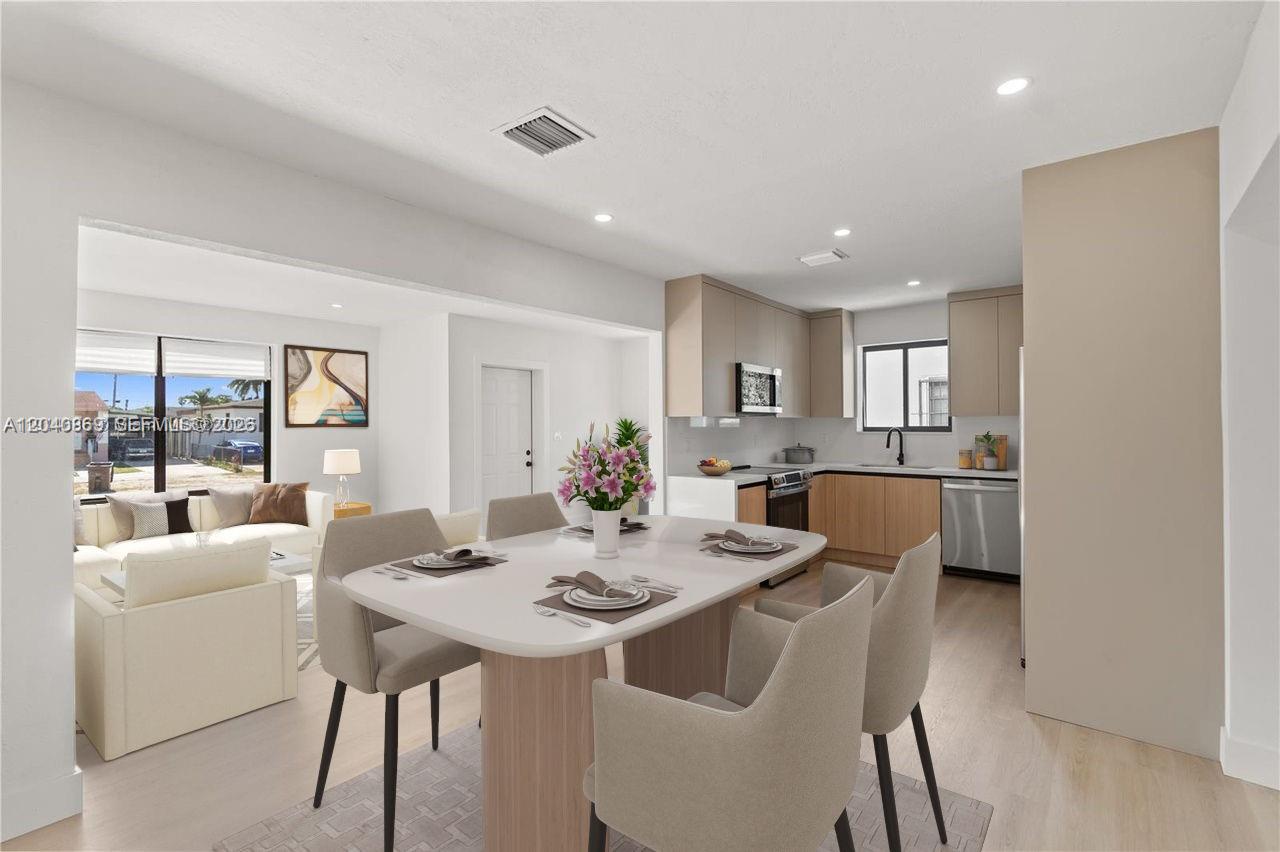 31 West 64th Street Hialeah, FL 33012 - Photo 22 of 49 a view of a dining room with furniture